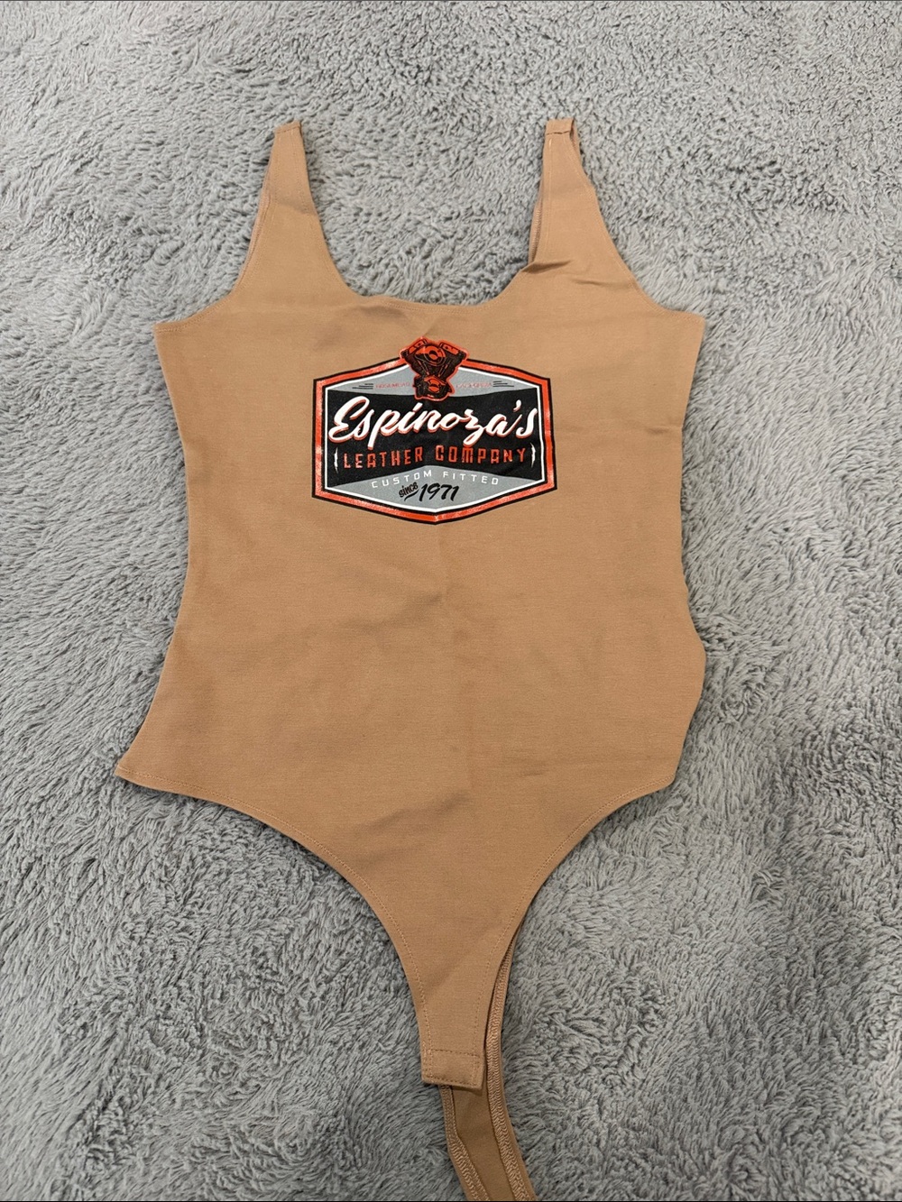 Espinoza’s Tan One-Piece Women's bodysuit